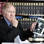 Michael Kirby admiring a picture of himself
