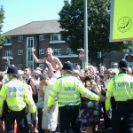 Police protecting Christians from homosexuals during a 'gay pride' march in Brighton in southern England.