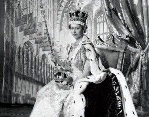 The Queen holds the Orb and Rod from the Crown Jewels after her coronation sixty years ago this Sunday.