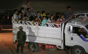 Christians flee the northern Iraqi city of Mosul.