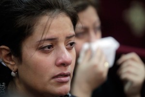 An Egyptian Christian woman mourns her daughter.