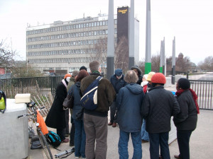 Praying on the Greenway at West Ham with Channel Sea House in the background.