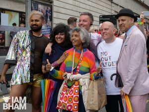 Ferham Khan (left) with ANdrew Moffat (2nd right) at Brimingham 'Pride' in 2019