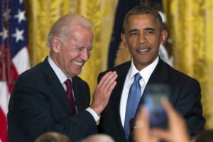 Joe Biden congratulates Barack Obama after the latter threw a guest out of a reception for LGBT activists