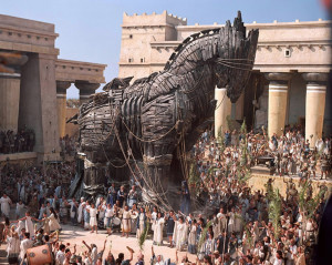 The Trojans drew the Greek gift of a wooden horse into their city, but Greek soldiers were hidden inside. (From the film ‘Troy’)