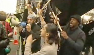 Anthony Small as Abdul Haqq in a demonstration against British Servicemen.