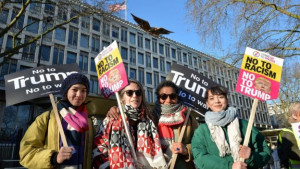 Anti-Trump women on the UK 'women's march' outside the US Embassy in London. But where are the placards from?