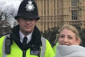 PC Keith Palmer was photographed with a tourist minutes before he was knifed by Khalid Masood