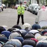 Muslims at prayer – in the street