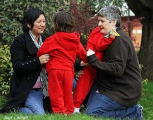Sarah Garrett and twins with Linda Riley