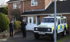 Police in plain uniforms guard the Skripal Front Door