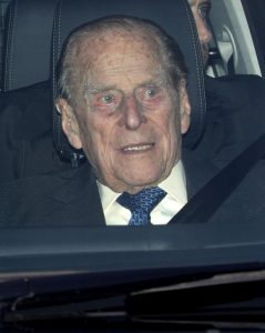 Prince Philip, HRH Duke of Edinburgh, in the front seat of his Land Rover Discovery.