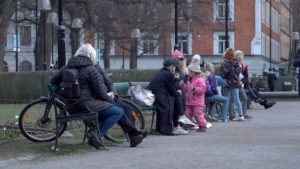 Families are able to enjoy the fresh air in a Stockholm park without any restrictions