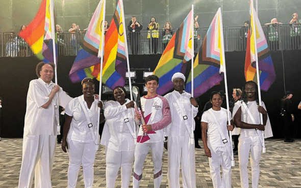 BBC and Daley Weaponise Games Tom Daley and others carrying 'Pride' flags into the Commonwealth Games