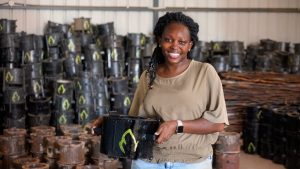 Charlot Magayi holds a Mukuru Clean Stove which won her an 'Earthshot Prize'