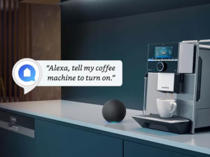 You can ask Alexa to ask your coffee machine to brew up. Why not just turn it on yourself?