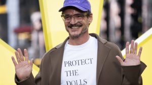 pedro pascal wearing protect the dolls.shirt