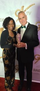 Stephen & Judy Green with the Award for Best Community Outreach Event at the GX Awards 2025.