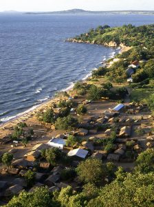 Net zero cash for Malawi villagers axed from aid budget. (habitation-shore-Lake-Malawi).