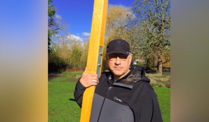 Paul Robinson, who leads the Christian charity Release International, will carry the cross up the peak | FACEBOOK