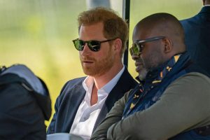 Prince Harry (l) and Misan (r)