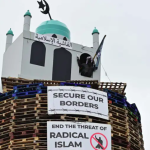 Northern Ireland man arrested for suspected hate crime after replica mosque placed on top of bonfire